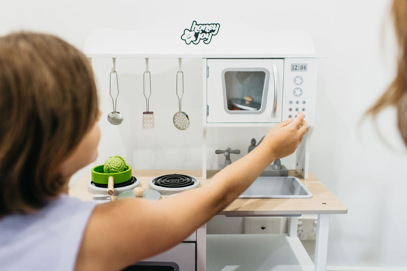What is Autism Spectrum Disorder? 3 Child playing with sensory toys