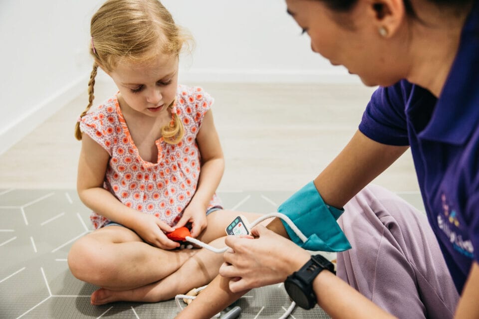 Child taking bloog pressure for practise